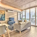 One Bedroom With Balcony And City Views