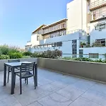 One Bedroom With Balcony And City Views
