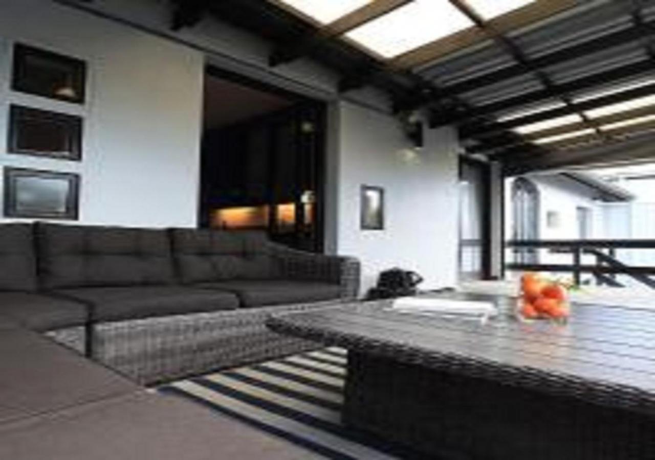 Urban Oasis At Windburg Suites