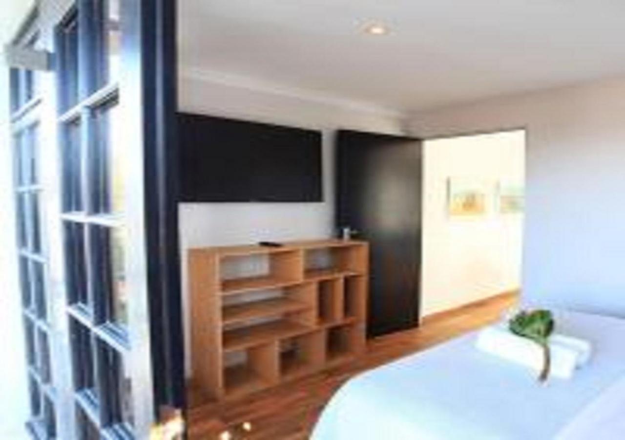 Apartment Urban Oasis At Windburg Suites