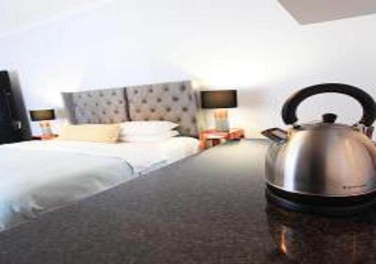 Urban Oasis At Windburg Suites *