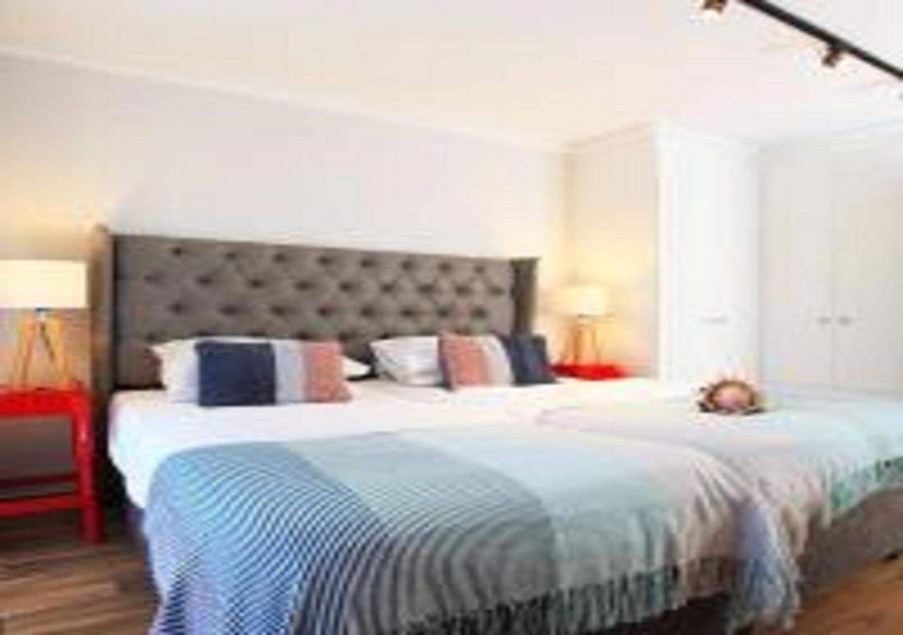 Urban Oasis At Windburg Suites *