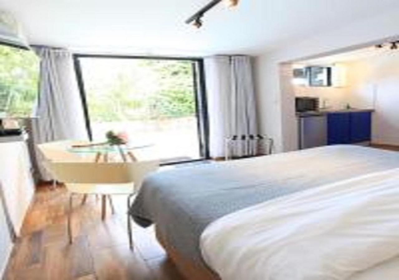 Apartment Urban Oasis At Windburg Suites