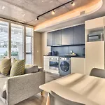 One Bedroom With Balcony And City Views