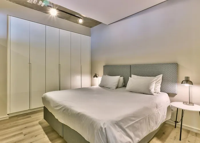 One Bedroom With Balcony And City Views