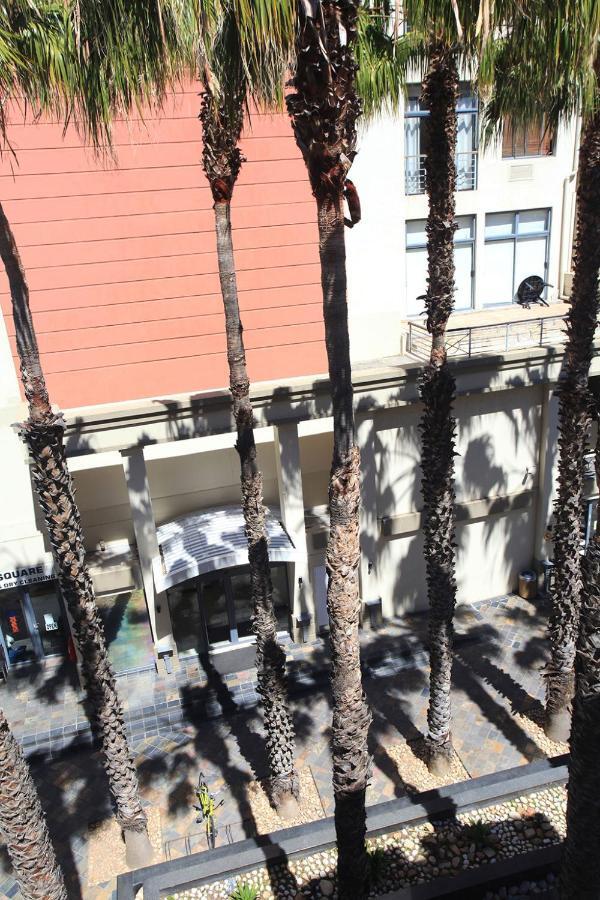 Urban Oasis At The Square Apartment