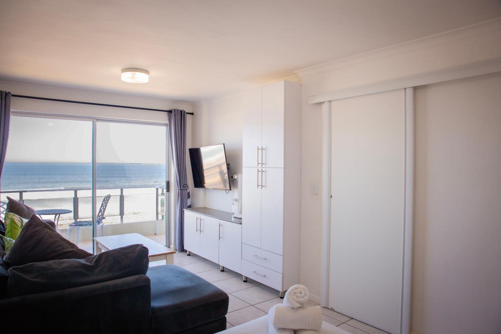 Apartment Bloubergstrand Beachfront Apartment With Secure Garage And Pool Cape Town